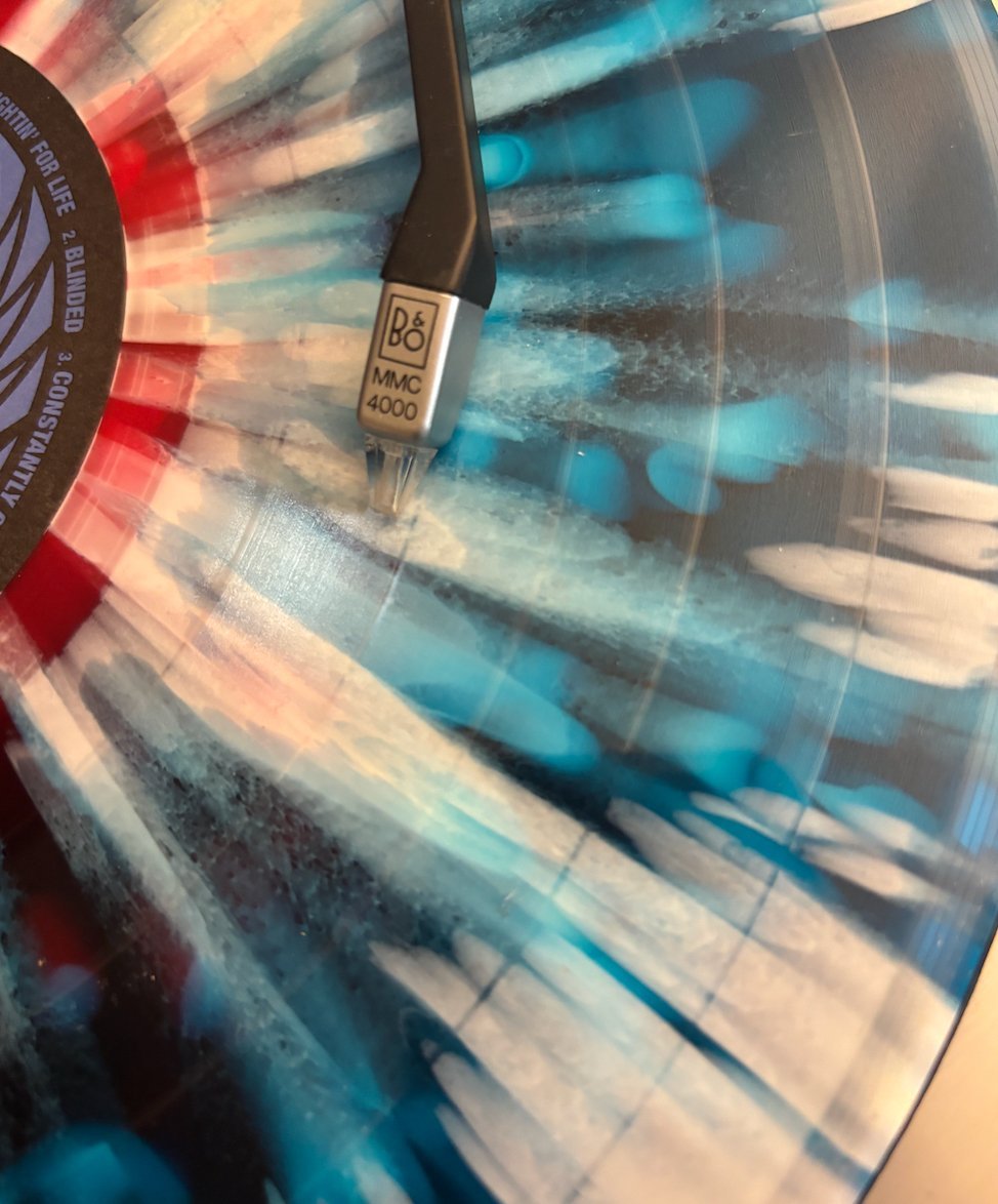 Ace Frehley - 10,000 Volts (IEX) Color In Color - Clear with Red, Blue & Silver Splatter Vinyl - BeatRelease